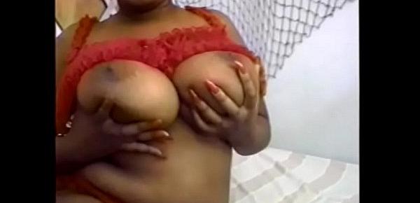  Black fatty licks her big boobs while a guy fucking her